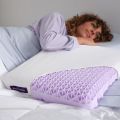model laying with purple pillow  thumbnail