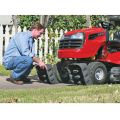 man placing ramps under mower  thumbnail