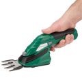 up close hand holding trimmer  thumbnail
