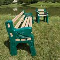 Side view of Park Bench on display by lake thumbnail