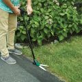 model using grass shears outside  thumbnail