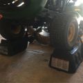 lawn mower on ramps in garage  thumbnail