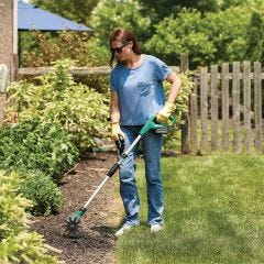 model using the precision tiller in flower bed