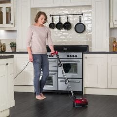 model using the Residential Floor Polisher in kitchen
