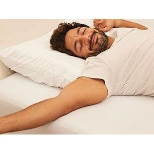 model laying on pillow 