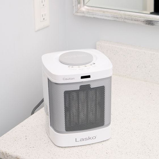 Ceramic Bathroom Space Heater with Fan in bathroom