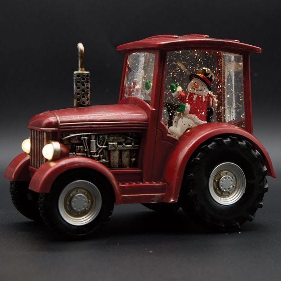 Red Tractor Snow Globe on black
