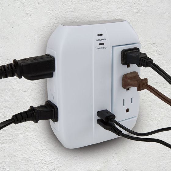 surge protector with cords and USB plugged in surge protector with cords and USB plugged in