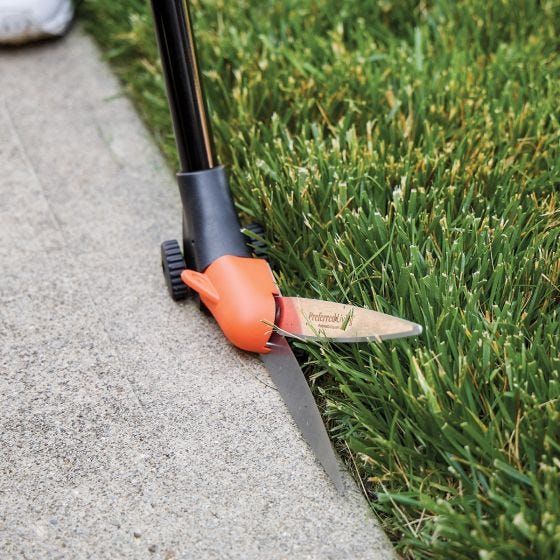 grass shears in use 