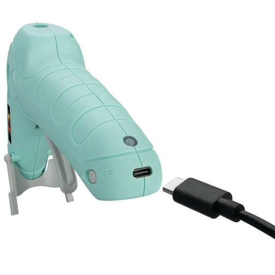 Hot Glue Gun plugged in to charge
