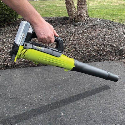 24v Lithium Cordless Leaf Blower Kit in use on driveway