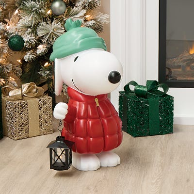 snoopy wuth red puffer jacket led porch greeter in interior christmas setting  